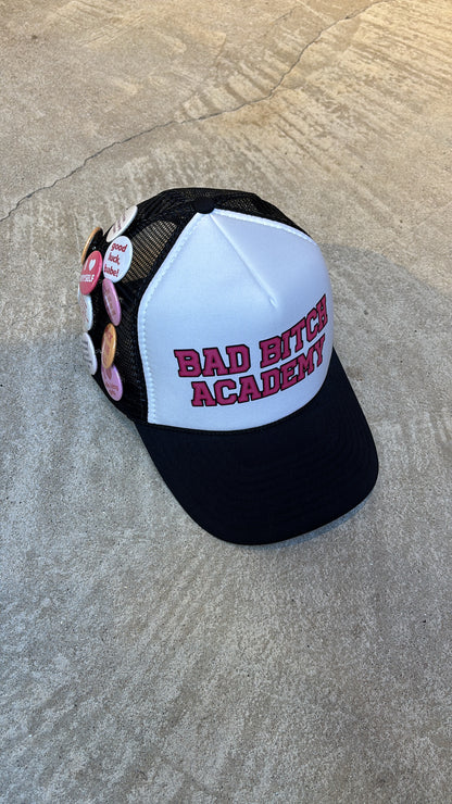 BAD BITCH ACADEMY BUTTON PIN TRUCKER